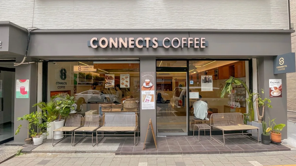 The street frontage of Connects Coffee Hapjeong at 60 Seongji-gil, with its name above the entrance.